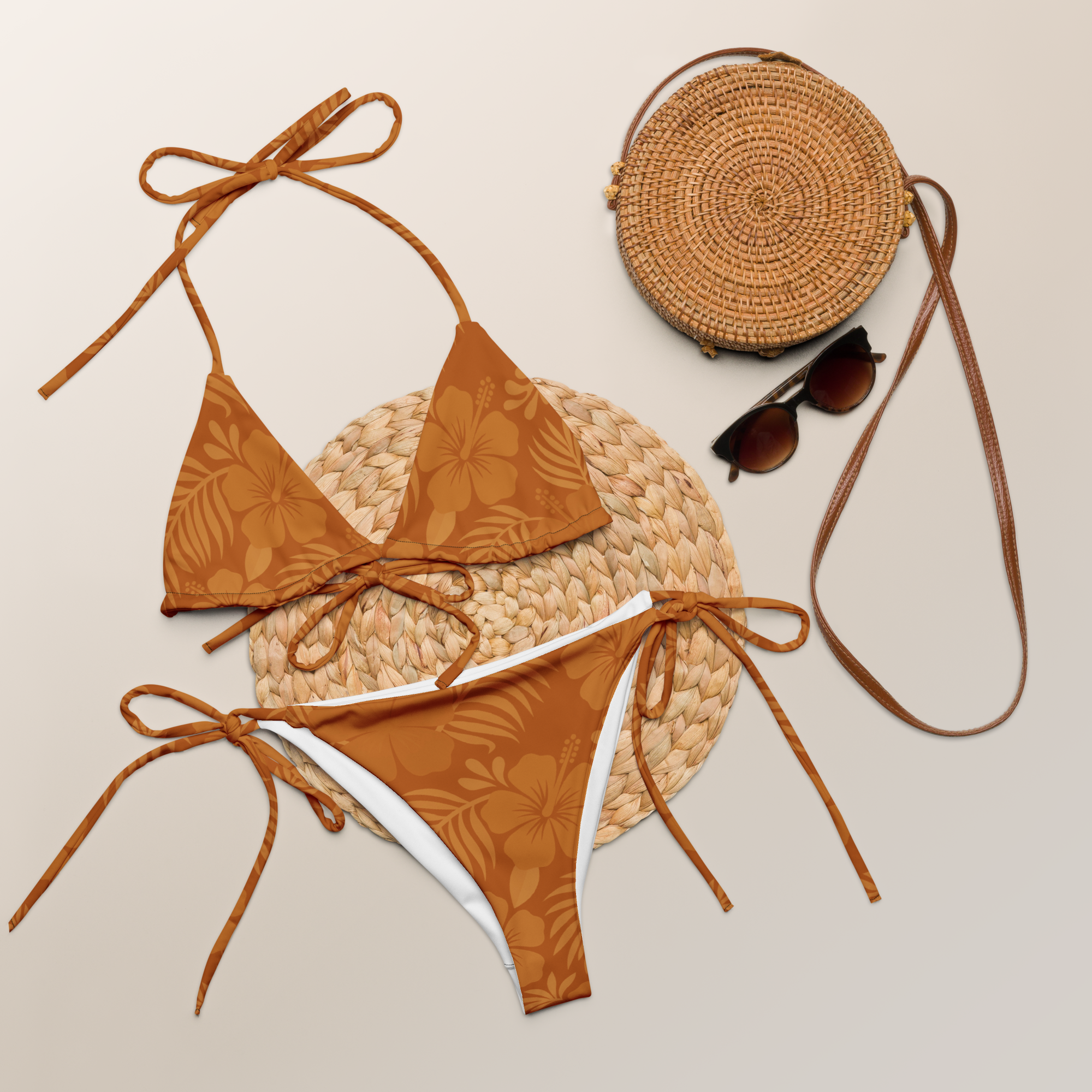 AI generated image of Clay Hibiscus recycled string bikini Product shot with accessories