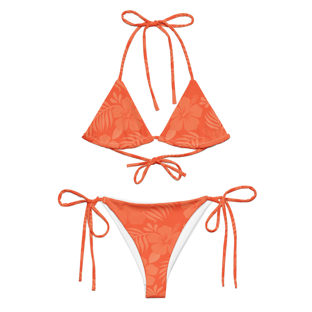 AI generated image of a Coral Hibiscus pattern recycled string bikini Product shot front