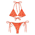 AI generated image of a Coral Hibiscus pattern recycled string bikini Product shot front on white background