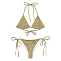 AI generated image of a Sand Hibiscus pattern recycled string bikini Product shot front
