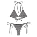 AI generated image of a Silver Grey Hibiscus pattern recycled string bikini Product shot front