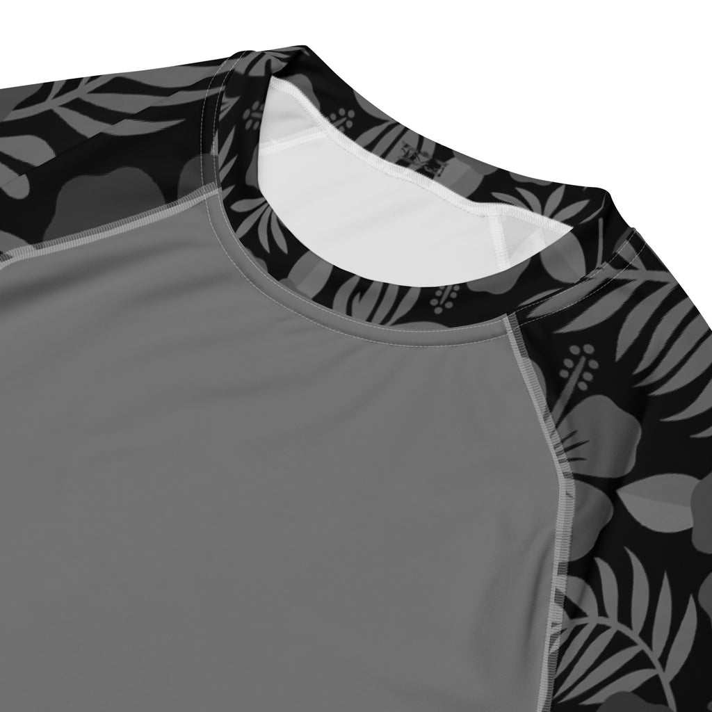 Majestic Vision Black Hibiscus recycled rash vest with UPF 50+ protection, moisture-wicking performance fabric and bold surf-inspired artwork. Recycled Short Sleeved Rash Guard Product mockup 5