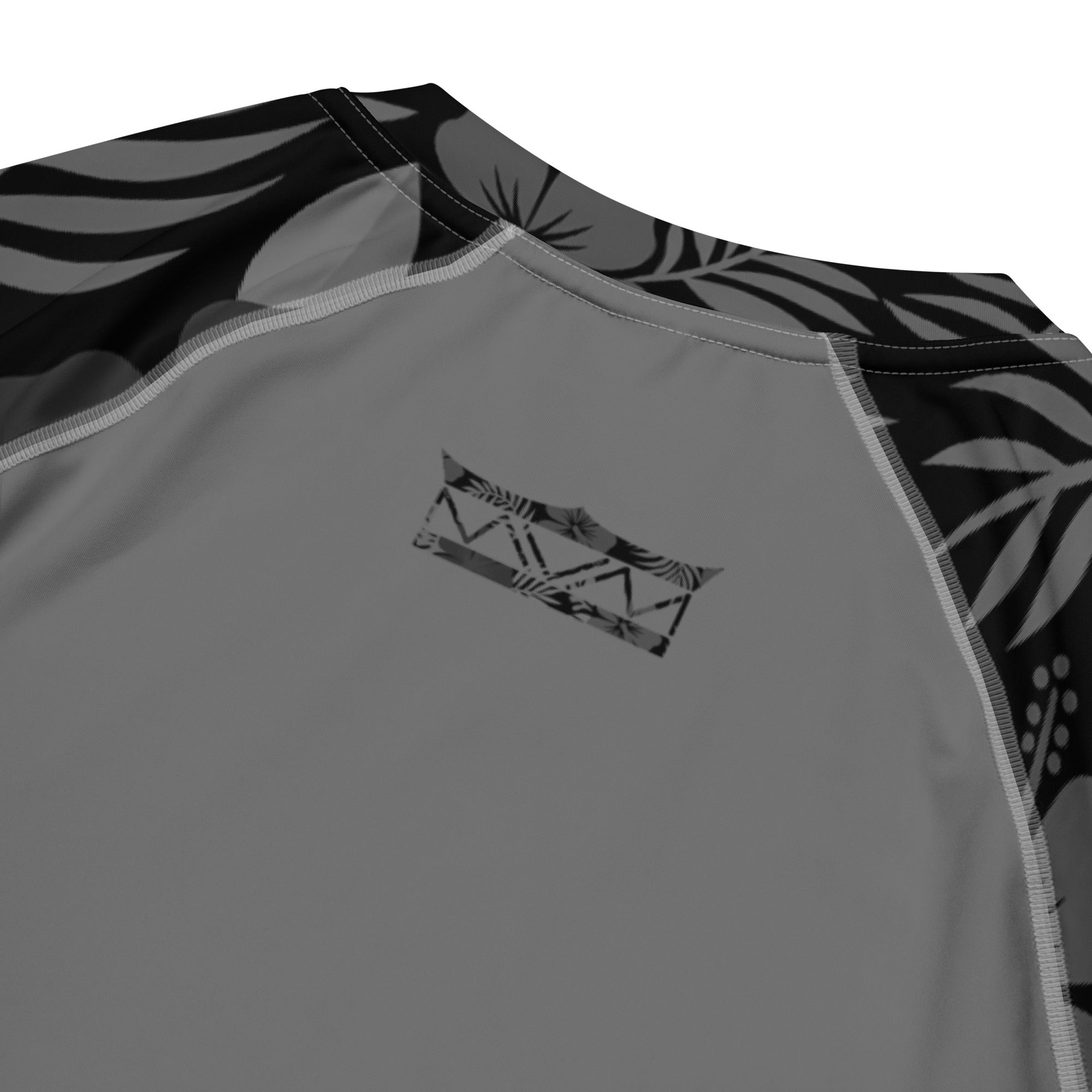 Majestic Vision Black Hibiscus recycled rash vest with UPF 50+ protection, moisture-wicking performance fabric and bold surf-inspired artwork. Recycled Short Sleeved Rash Guard Product mockup 6