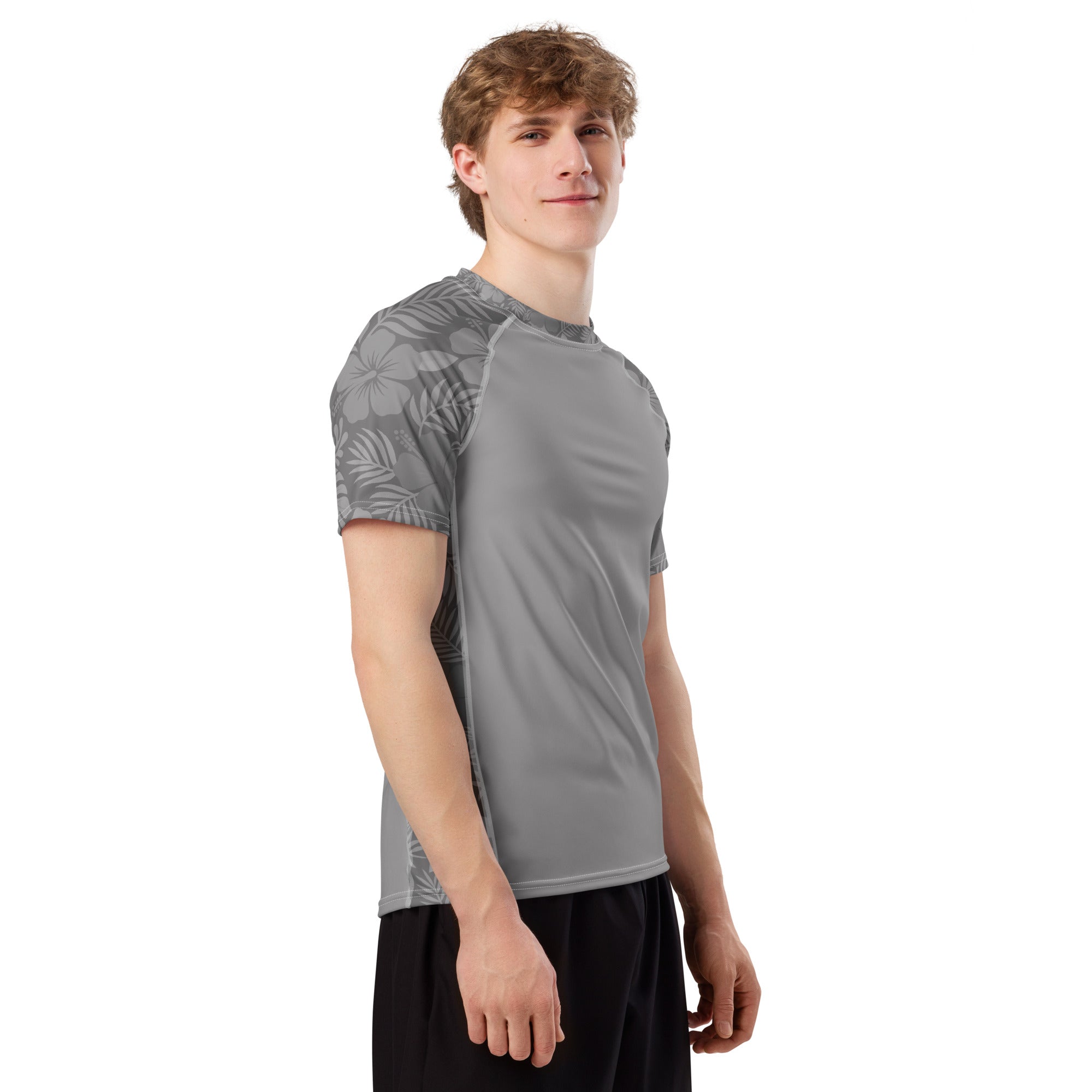 Grey Hibiscus recycled rash vest with UPF 50+ protection, moisture-wicking performance fabric and bold surf-inspired artwork. Recycled Short Sleeved Rash Guard Product mockup studio style.