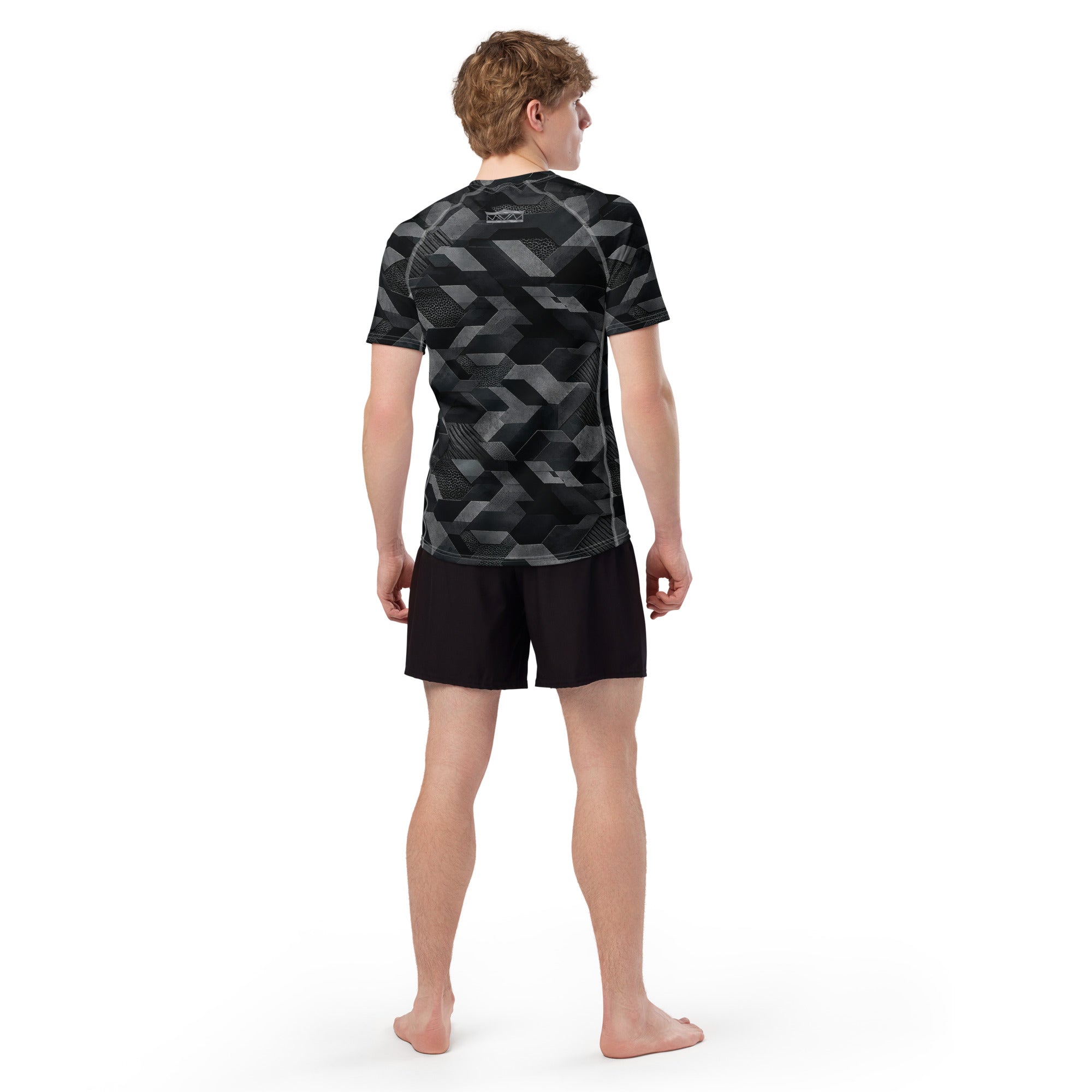 MVM Black Sci Fi Camo recycled rash vest with UPF 50+ protection, moisture-wicking performance fabric and bold surf-inspired artwork. Recycled Short Sleeved Rash Guard from behind Product mockup studio style
