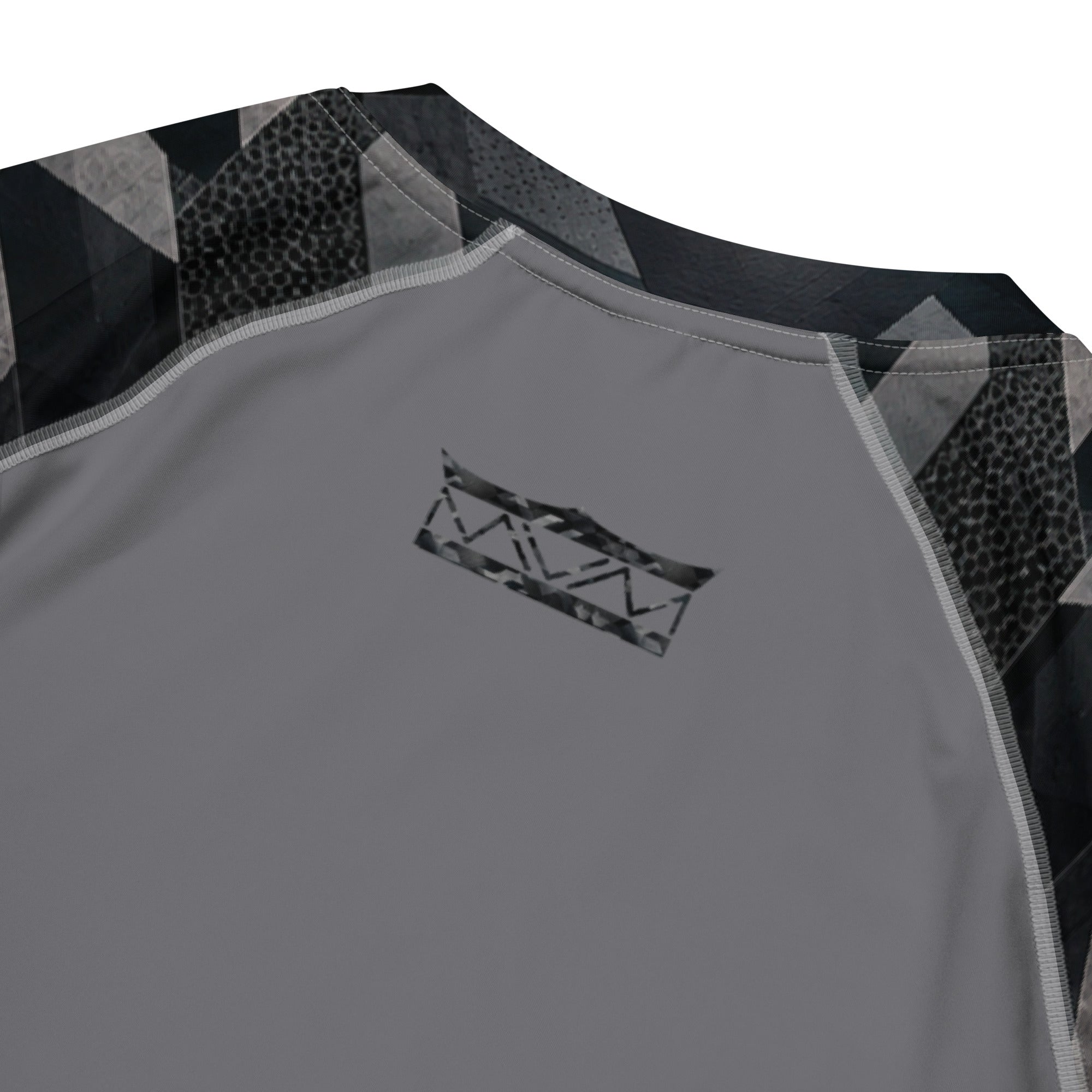 MVM Grey and Black Sci Fi Camo recycled rash vest with UPF 50+ protection, moisture-wicking performance fabric and bold artwork. Recycled Short Sleeved Rash Guard back close up Product mockup
