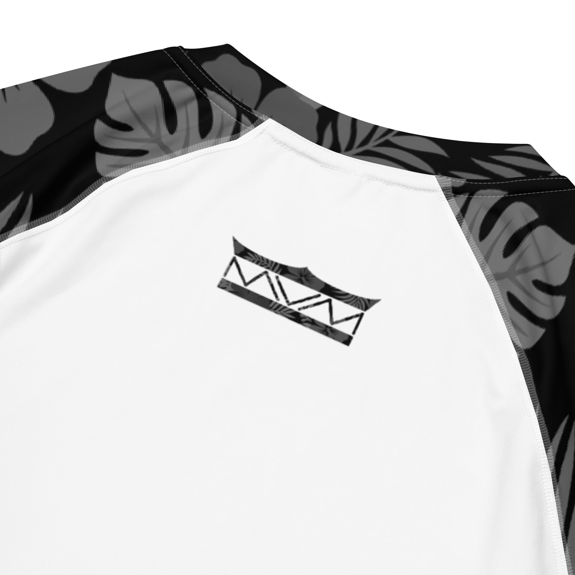 Majestic Vision Black Hibiscus and white recycled rash vest with UPF 50+ protection, moisture-wicking performance fabric and bold surf-inspired artwork from behind. Close up back product mockup