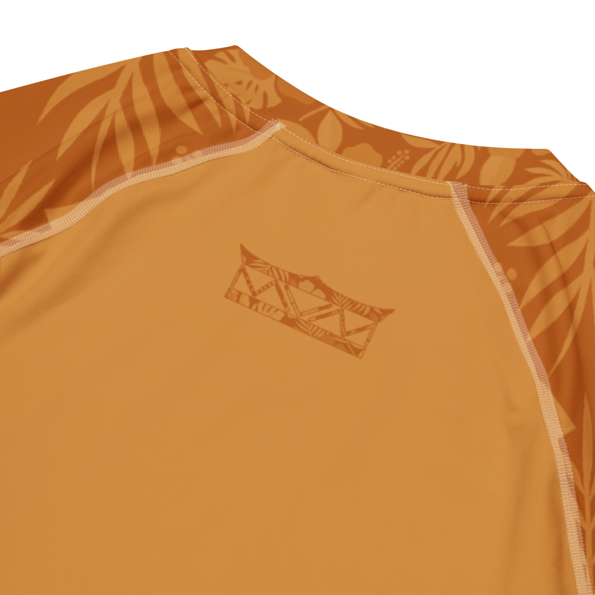 Majestic Vision Clay Hibiscus recycled rash vest with UPF 50+ protection, moisture-wicking performance fabric and bold surf-inspired artwork. Recycled Short Sleeved Rash Guard back close up Product mockup