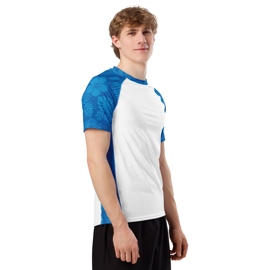 Ocean Blue Hibiscus and white recycled rash vest with UPF 50+ protection, moisture-wicking performance fabric and bold surf-inspired artwork. Recycled Short Sleeved Rash Guard Product mockup studio style.
