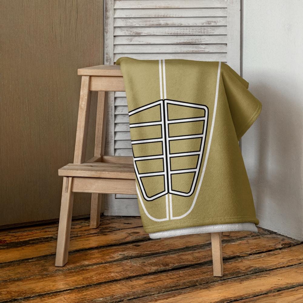 Sand Surf Pop-Up Training Mat – Oversized Quick-Dry Beach Towel with Stance Placement Guide on chair