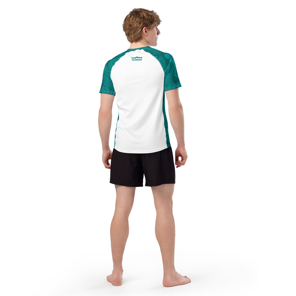 Majestic Vision Teal Hibiscus and white recycled rash vest with UPF 50+ protection, moisture-wicking performance fabric and bold surf-inspired artwork. Recycled Short Sleeved Rash Guard from behind Product mockup studio style