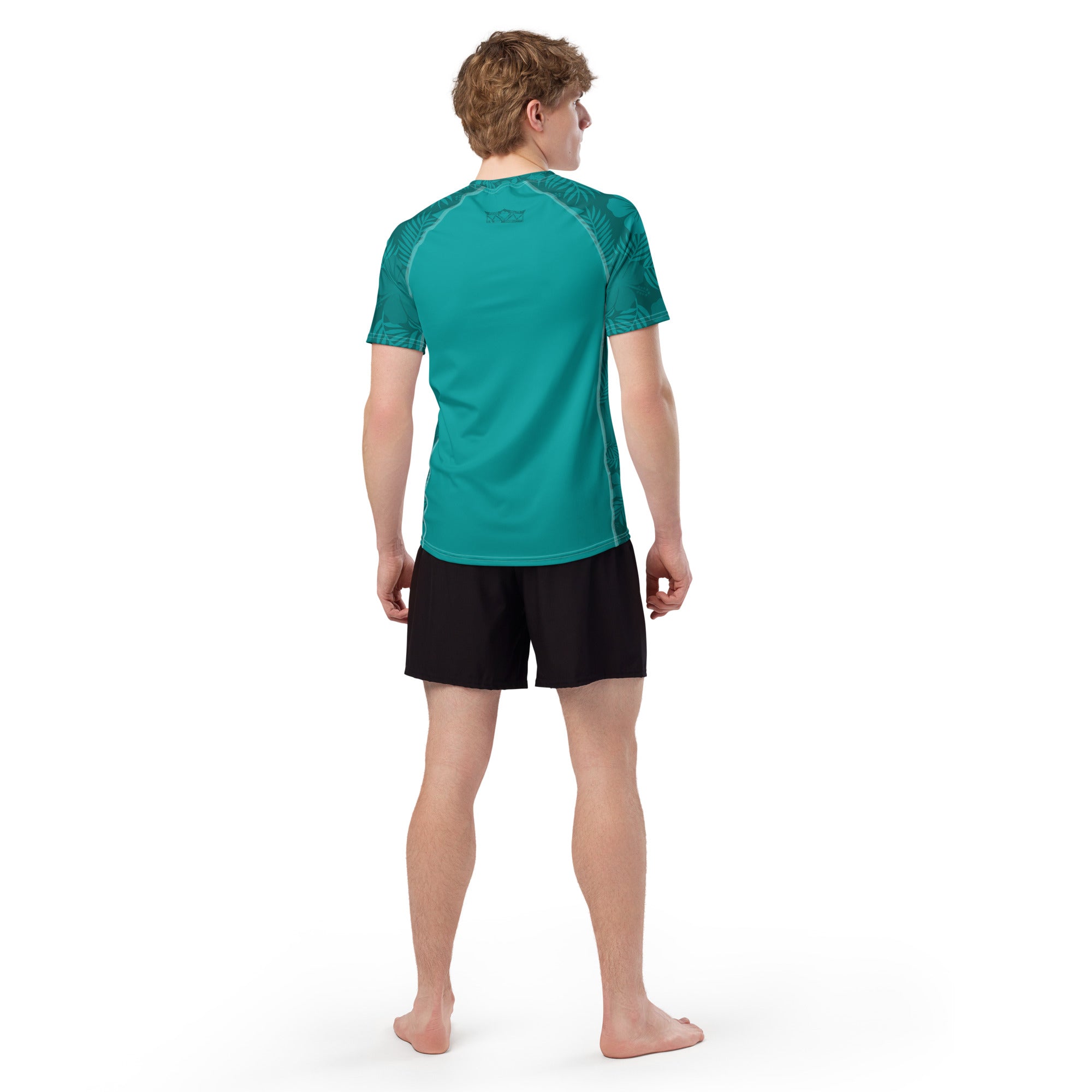 Majestic Vision Teal Hibiscus recycled rash vest with UPF 50+ protection, moisture-wicking performance fabric and bold surf-inspired artwork. Recycled Short Sleeved Rash Guard from behind Product mockup studio style