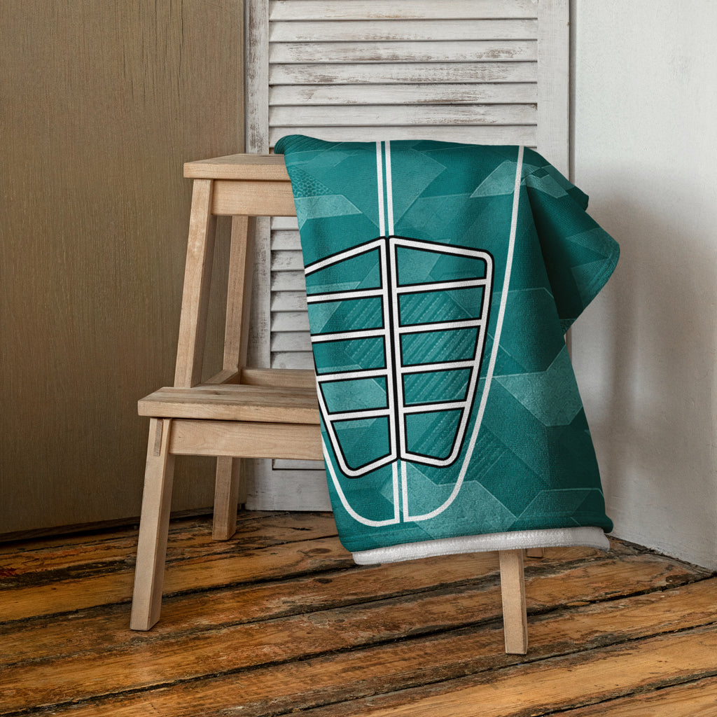 Teal Sci Fi Camo Surf Pop-Up Training Mat – Oversized Quick-Dry Beach Towel with Stance Placement Guide on chair