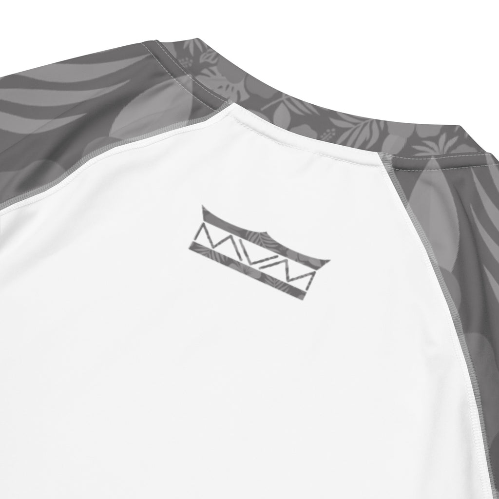 Majestic Vision Grey Hibiscus and white recycled rash vest with UPF 50+ protection, moisture-wicking performance fabric and bold surf-inspired artwork. Recycled Short Sleeved Rash Guard back close up Product mockup